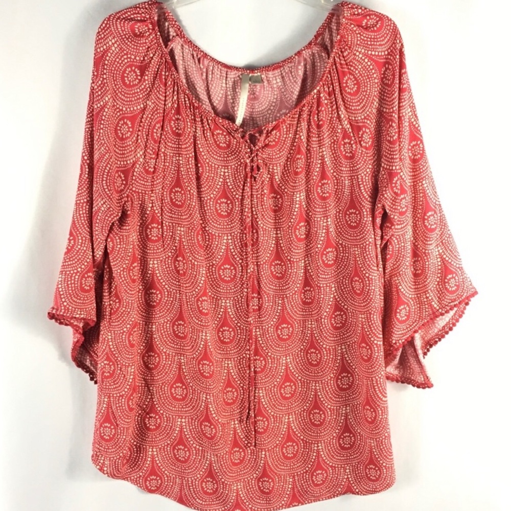 Loose fitting red blouse